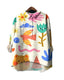 Colourful women's shirt with cartoon designs on a white background